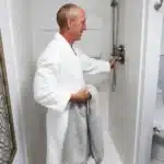 Elderly man going to shower